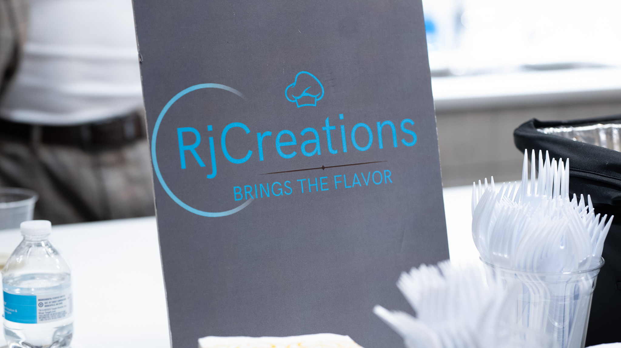 RjCreations catering logo at the 2025 event